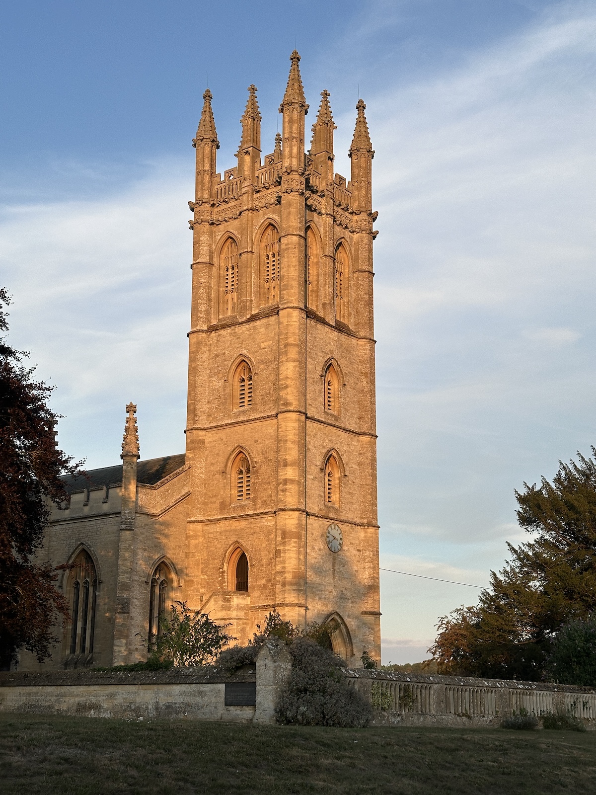 Golden-hour light on a Cotswold parish church tower